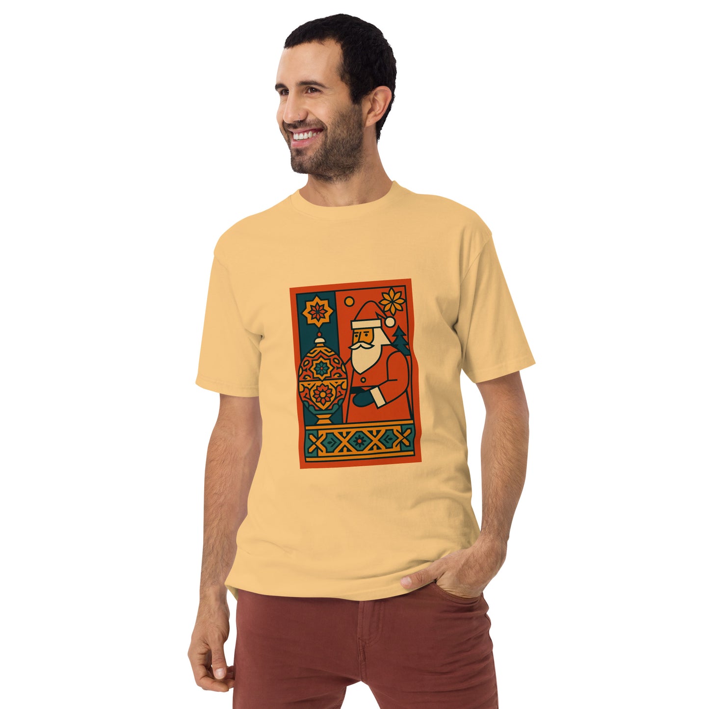 Man wearing a yellow t-shirt with a colorful graphic design on a white background