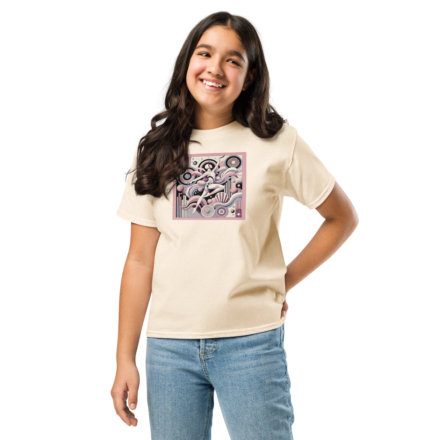 Young girl wearing a beige t-shirt with a colorful graphic design on a white background