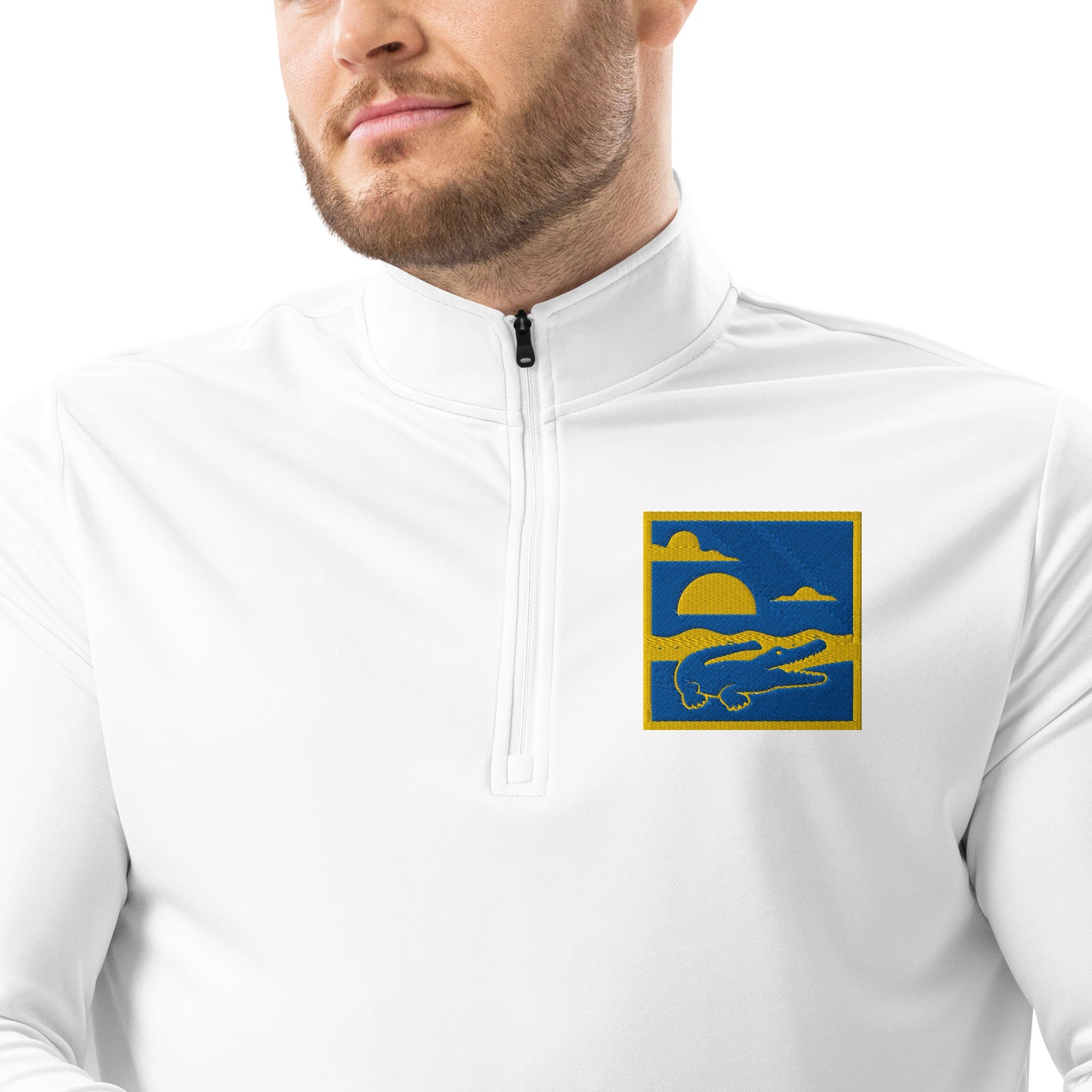 White jacket with a logo on the chest worn by a person