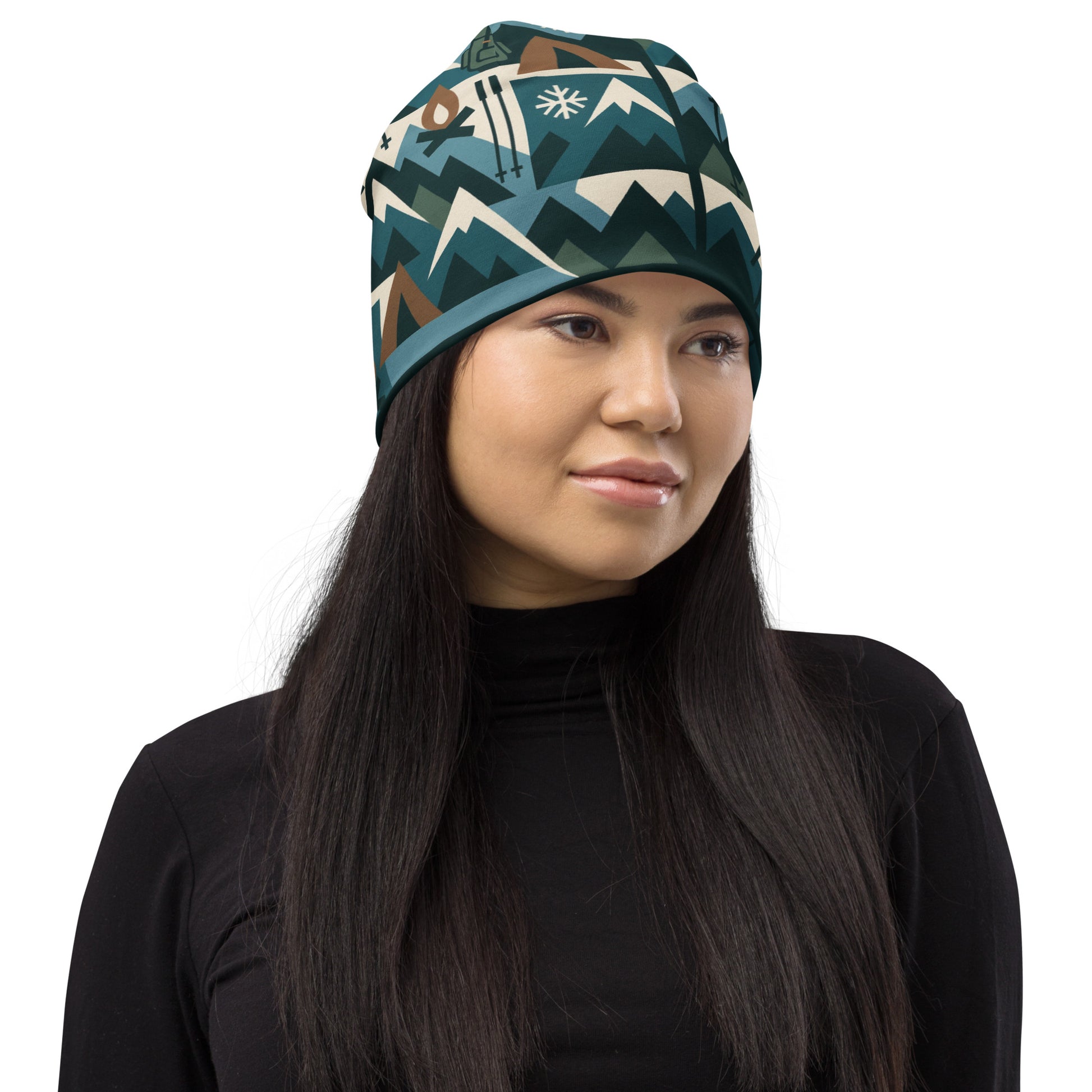 Woman wearing a patterned beanie on a white background