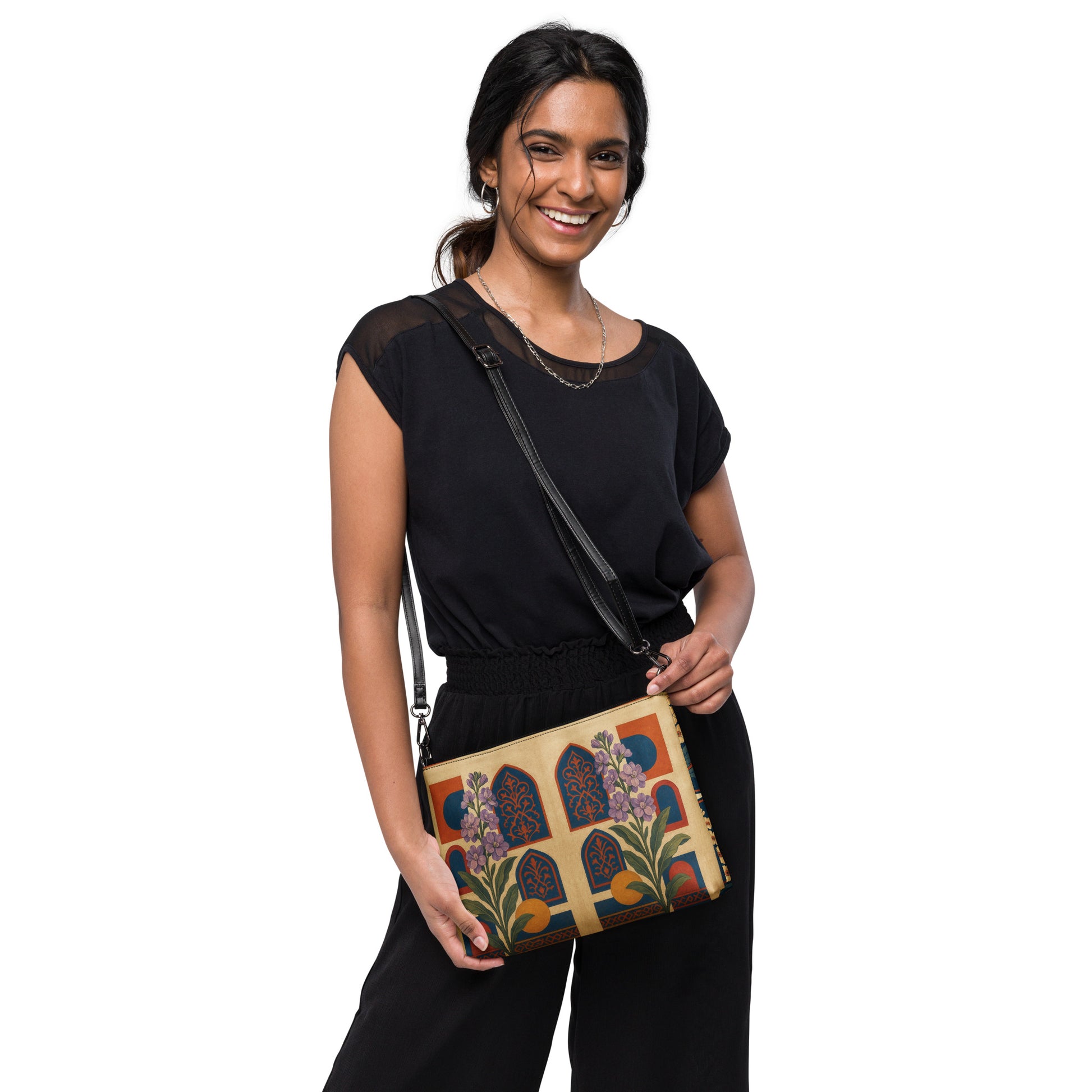 Woman holding a colorful handbag with a white background