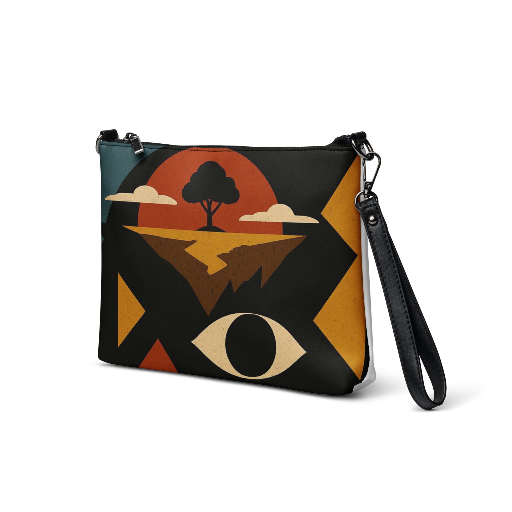 Purse with abstract design featuring a tree, eye, and landscape on a white background