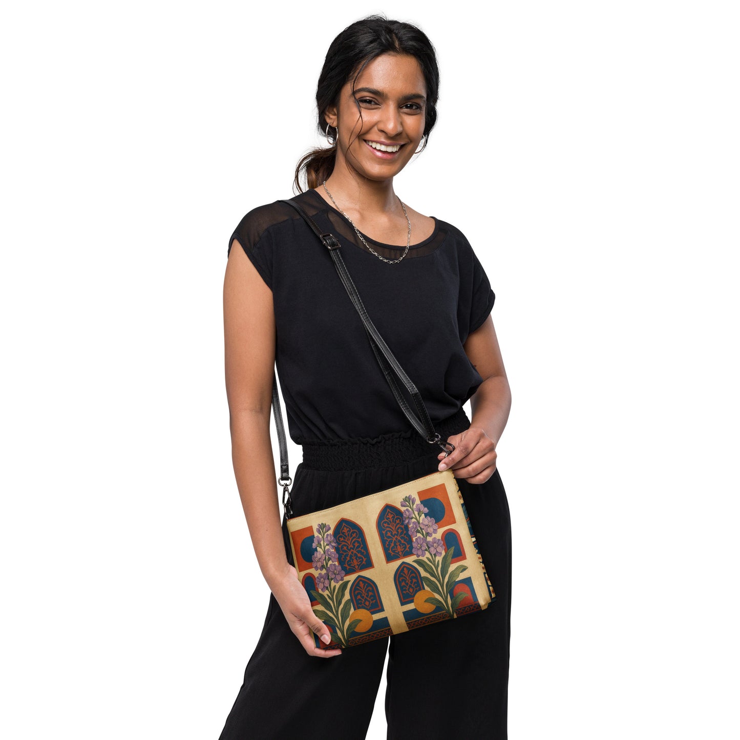 Woman holding a colorful handbag with a white background
