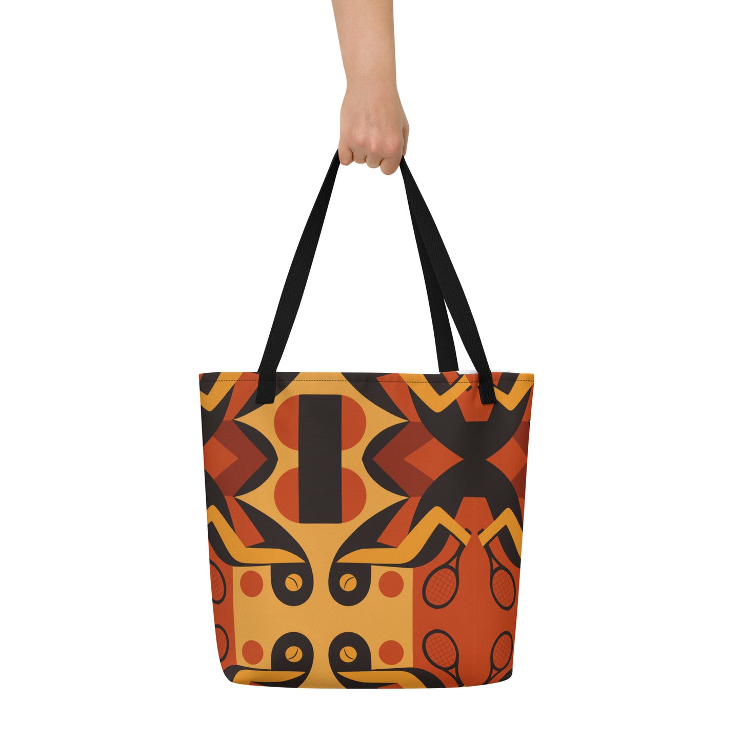 Tote bag with a colorful geometric pattern held by a person on a white background
