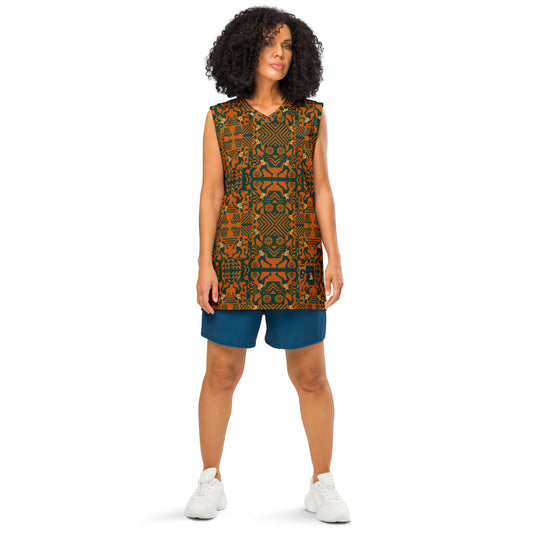 Woman wearing a patterned sleeveless dress and blue shorts on a white background