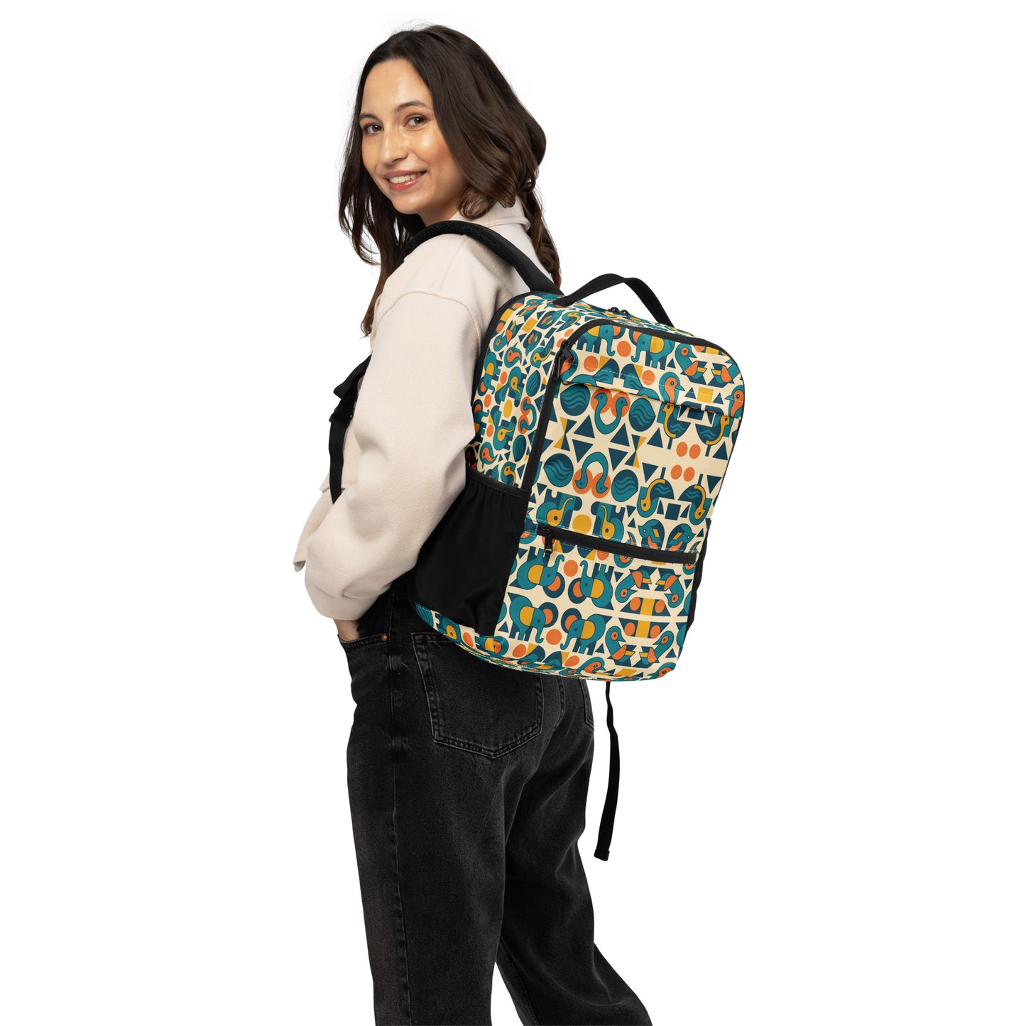 Person wearing a colorful patterned backpack on a white background