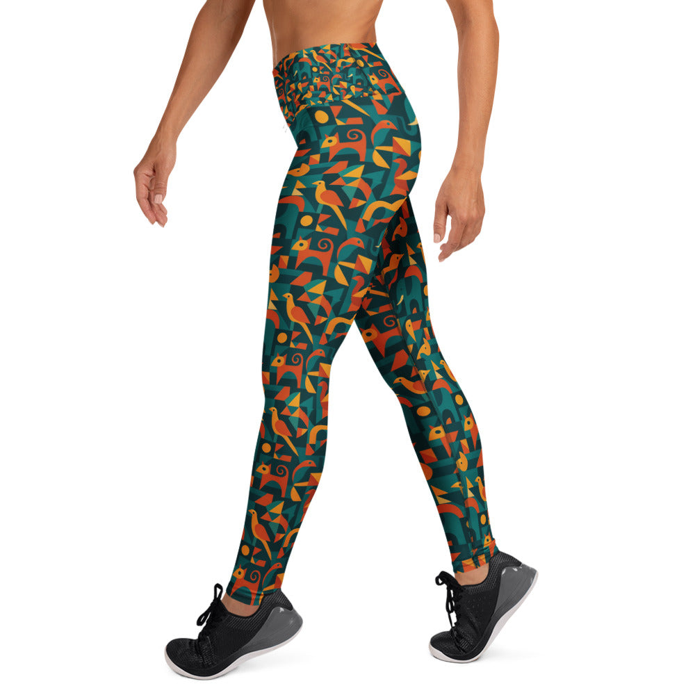 Leggings with a colorful pattern worn by a person on a white background
