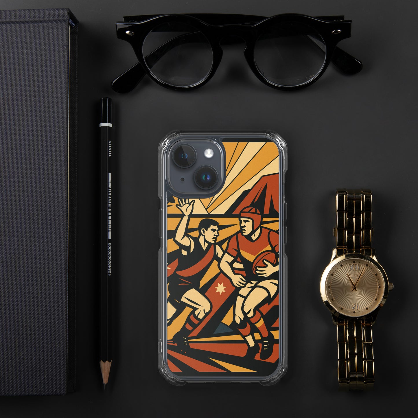 Phone case with sports design, glasses, pen, pencil, notebook, and watch on a dark surface