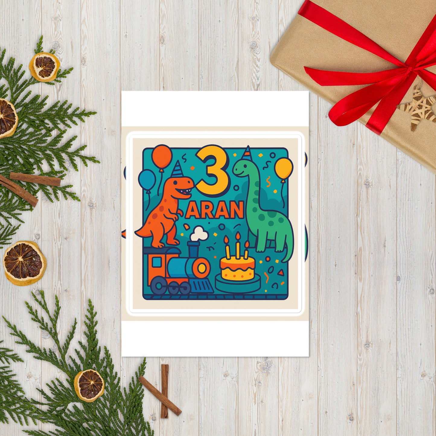 Children's birthday card with colorful illustrations of dinosaurs, a train, and a cake on a wooden surface with decorative elements.