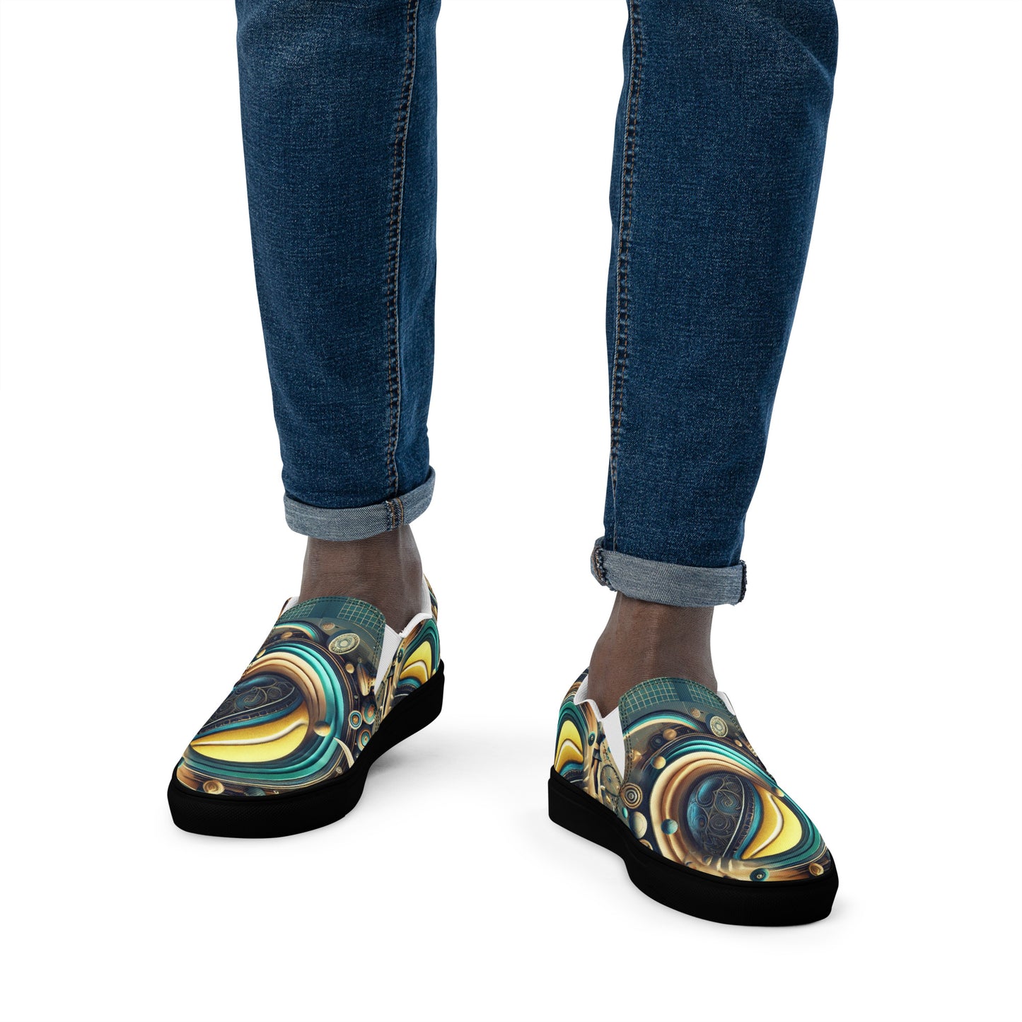 Colorful abstract-patterned shoes worn with blue jeans on a white background