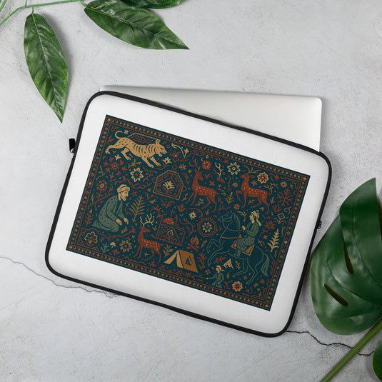 Laptop sleeve with nature-themed design on a light gray surface with leaves.