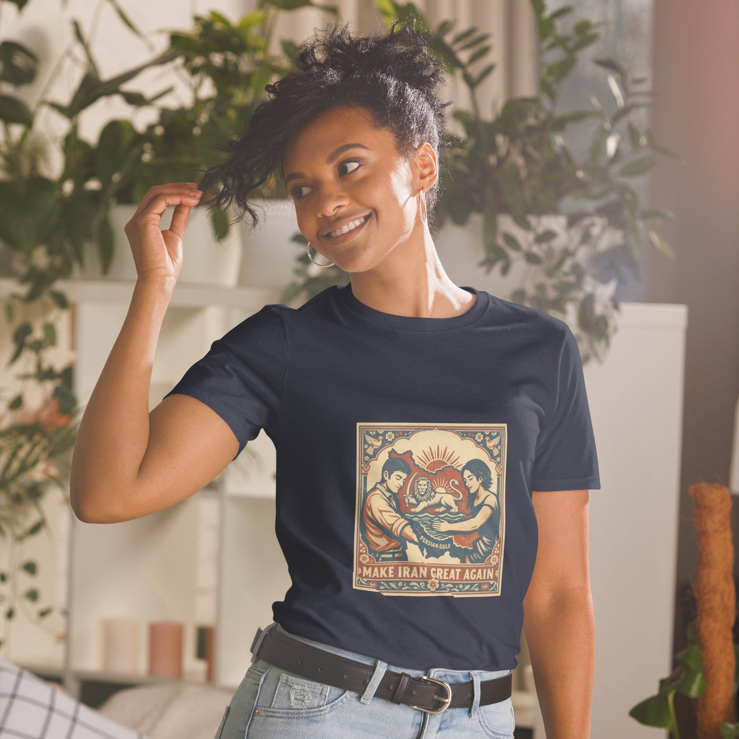 Woman wearing a navy blue t-shirt with a graphic design in an indoor setting