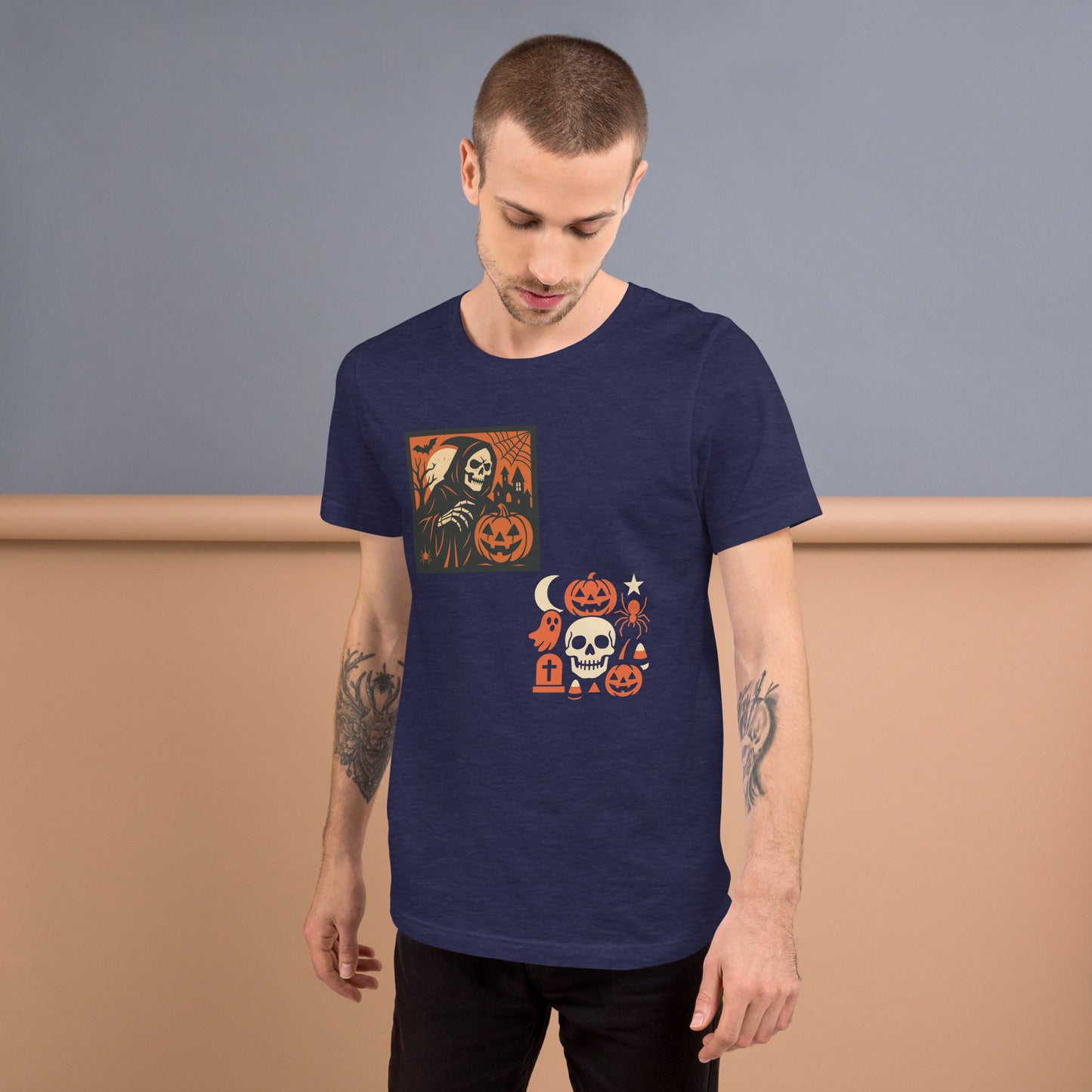 Man wearing a navy blue t-shirt with Halloween-themed graphics against a plain background