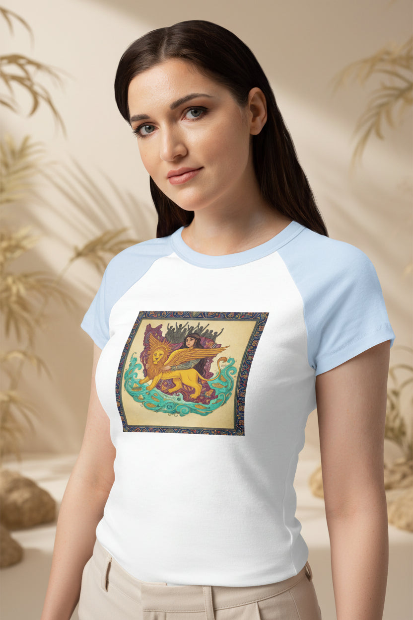 Woman wearing a white t-shirt with a colorful graphic design on a plain background