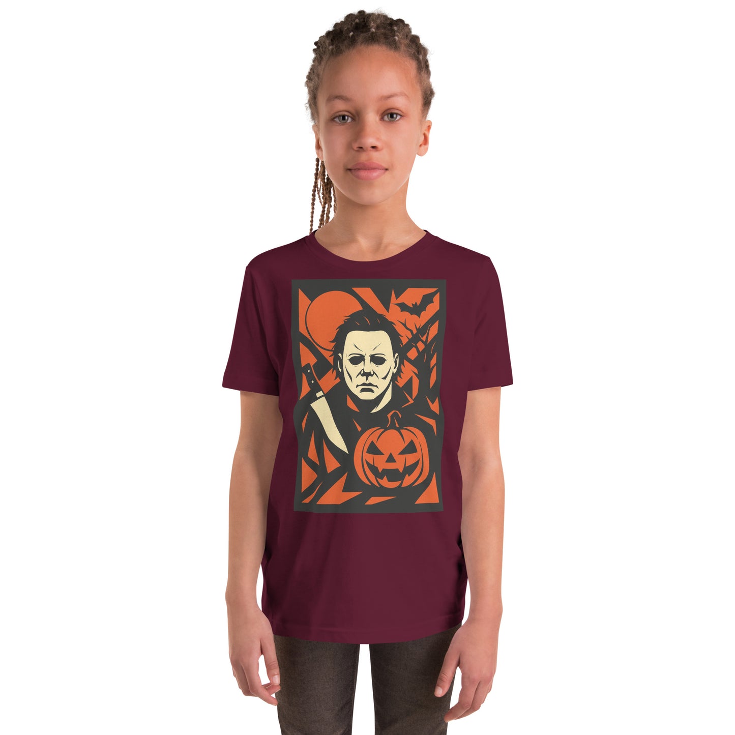 HALLOWEEN Child wearing a maroon t-shirt with a graphic design on a white background