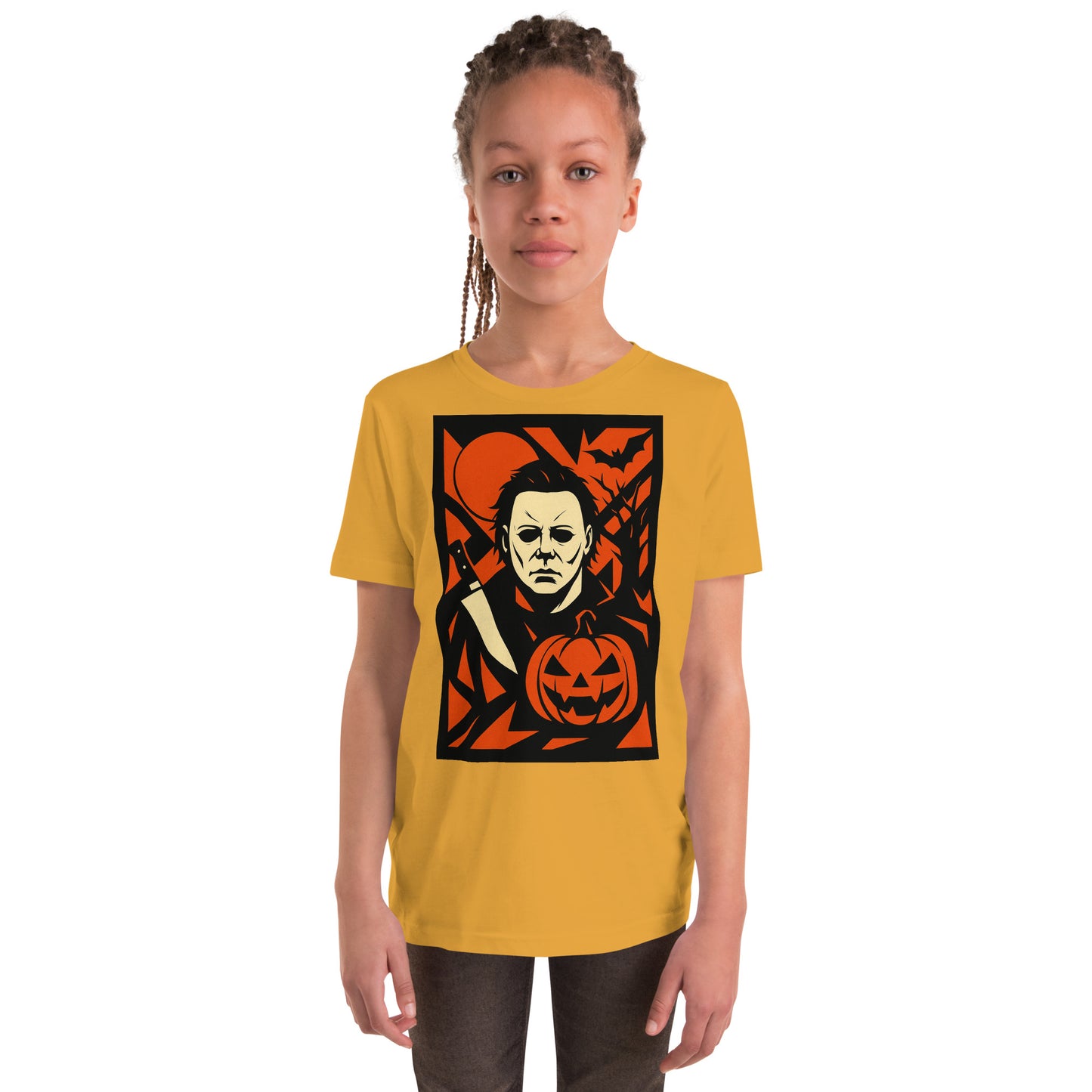Child wearing a yellow t-shirt with a graphic design of a face and pumpkin on a white background
